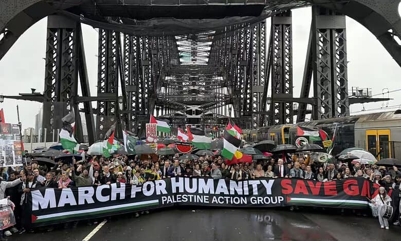 Protesters walk across Sydney Harbour Bridge during pro-Palestinian rally.