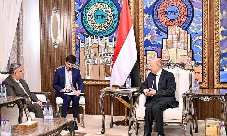 Yemen’s President Rashad al-Alimi meets Indian Ambassador Suhel Khan in Riyadh, seated across a table with officials and Yemen’s national flag in the background.