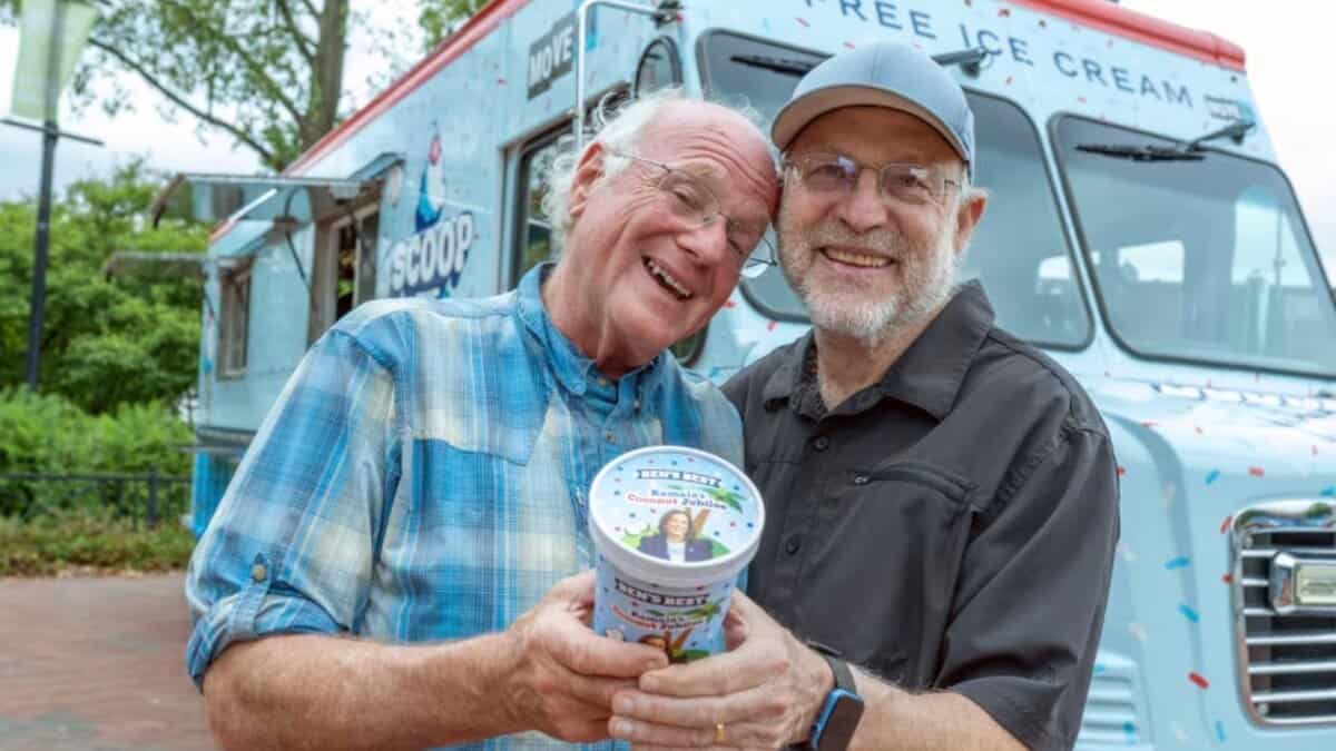 Ben Cohen (left) and Jerry Greenfield (right), co-founders of Ben & Jerry’s, hand out free ice cream