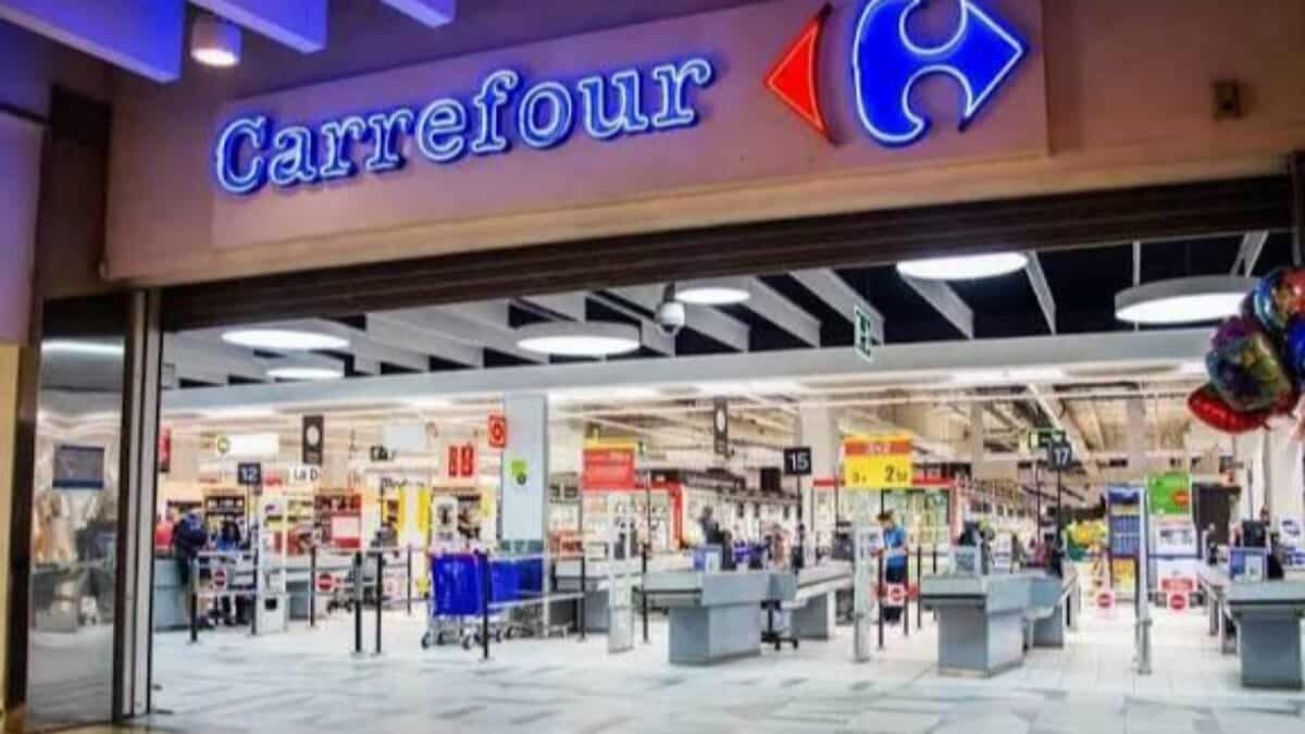 Carrefour supermarket entrance with checkout counters.