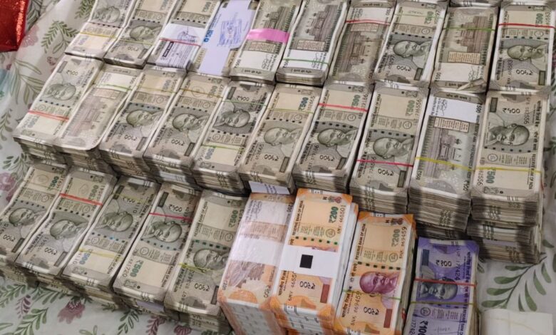 Cash seized from the electricity department ADE's house in Hyderabad
