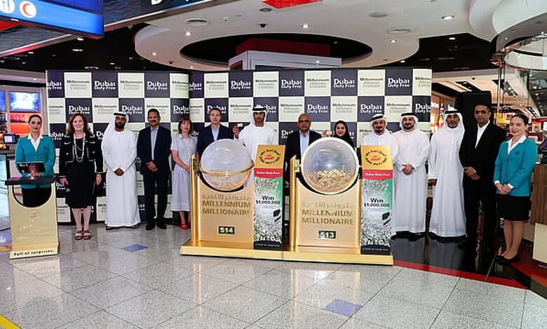 Dubai Duty Free officials and participants pose during the Millennium Millionaire draw at Dubai International Airport.