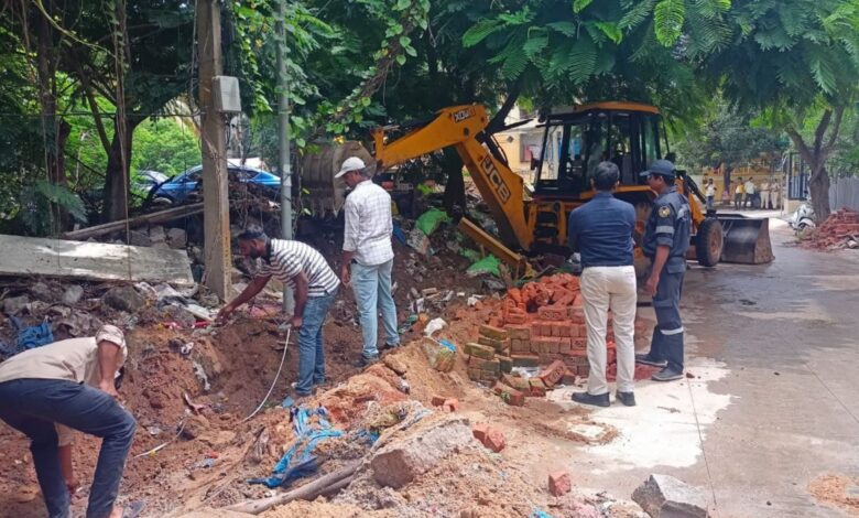 HYDRAA officials clear encroachments from parks in Hyderabad.