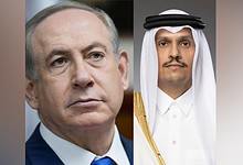 The image of Israeli Prime Minister Benjamin Netanyahu and Qatari Prime Minister Mohammed bin Abdulrahman Al Thani.