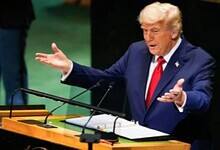 US President Donald Trump gestures while speaking at the United Nations General Assembly podium.