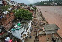 The Gujjarnagar area of Jammu's Tawi River which continues to flow amid rainfall. (PTI Photo)