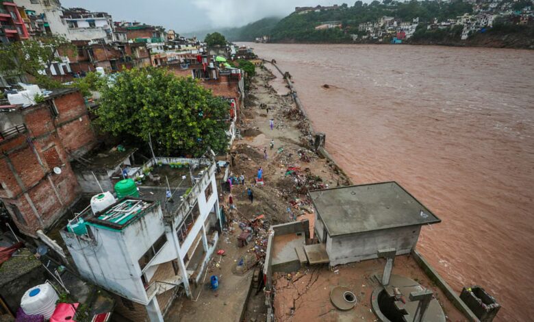 The Gujjarnagar area of Jammu's Tawi River which continues to flow amid rainfall. (PTI Photo)
