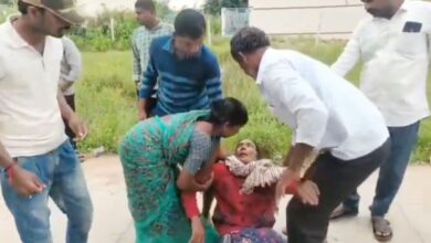 A woman farmer collapses while waiting to purchase urea in Telangana