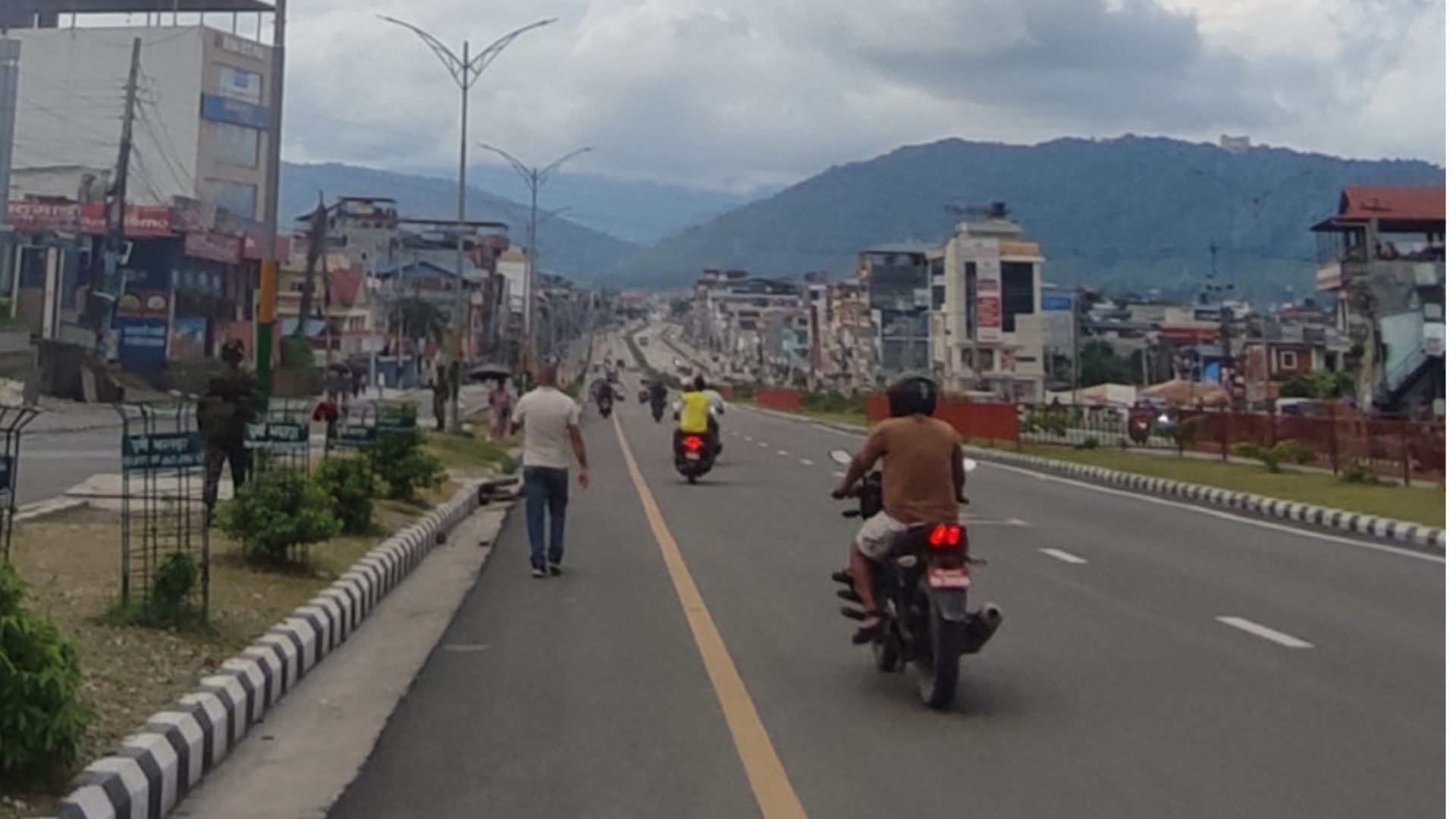 People resume work after curfew is lifted in Kathmandu