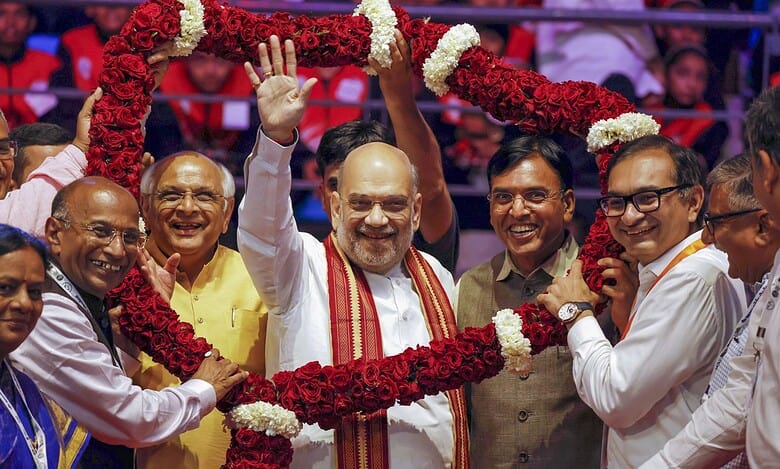 Union Home Minister Amit Shah, Union Sports Minister Mansukh Mandaviya, Gujarat Chief Minister Bhupendra Patel and others during the inauguration of Veer Savarkar Sports Complex in Gujarat on Sunday (PTI)