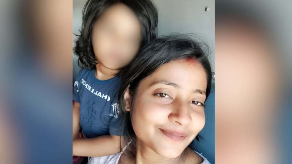 Anjali with her three-year-old daughter (face blurred)
