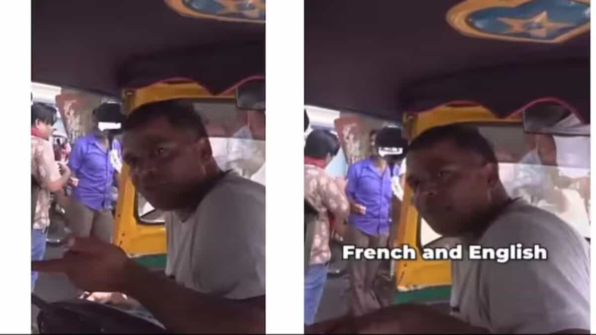 An auto driver in India speaks fluent English and French