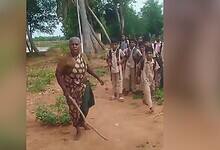An elderly upper caste woman blocks school going children from the Dalit community from using a path. The incident occurred in Tamil Nadu
