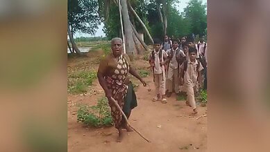 An elderly upper caste woman blocks school going children from the Dalit community from using a path. The incident occurred in Tamil Nadu