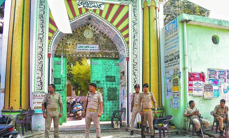 Police personnel stand guard outside a dargah in Bareilly, Uttar Pradesh (PTI Photo)