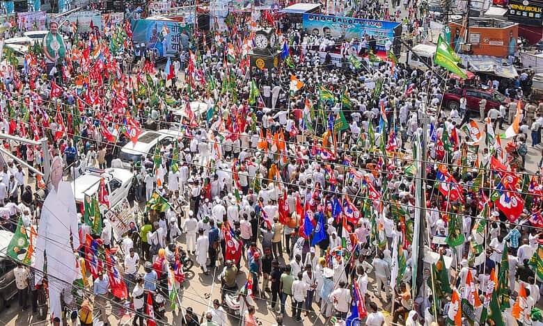 People gather during a march marking culmination of 'Vote Adhikar Yatra' in Patna on Monday. (PTI Photo)