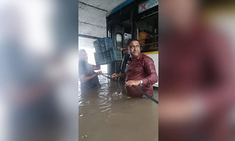Police rescue passengers stuck in floodwater in Warangal