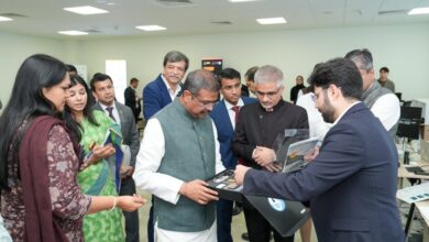 The image of Union Education Minister Dharmendra Pradhan interacts with officials and innovators during the inauguration of the Atal Incubation Centre at IIT Delhi’s Abu Dhabi campus.