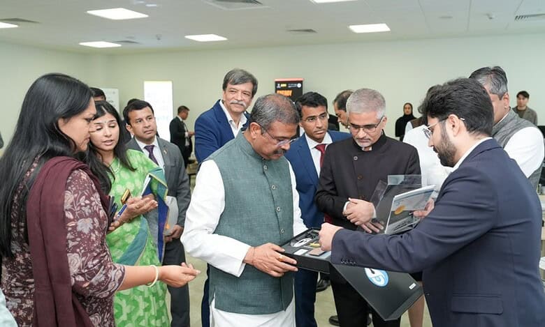 The image of Union Education Minister Dharmendra Pradhan interacts with officials and innovators during the inauguration of the Atal Incubation Centre at IIT Delhi’s Abu Dhabi campus.
