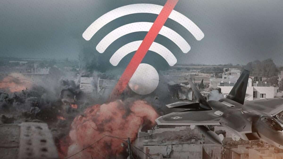 Wi-Fi signal symbol with red slash over Gaza airstrikes, representing internet blackout during Israeli bombardment.