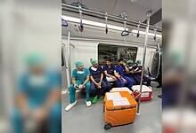 Medical professionals transporting organs on the Hyderabad metro