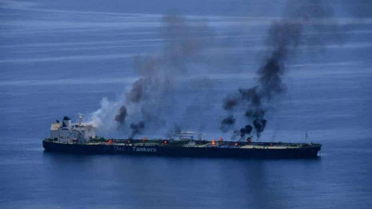 Oil tanker in the Red Sea with multiple fires and black smoke rising from the deck after an attack.