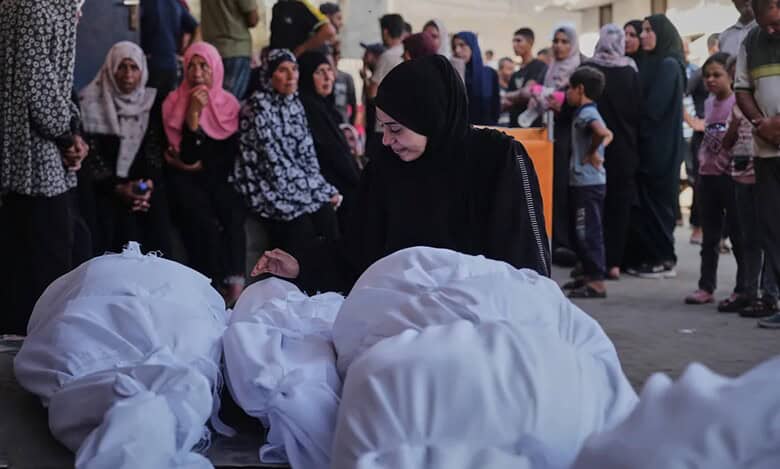 Palestinians mourn during a funeral for victims killed in an Israeli airstrike in Gaza.