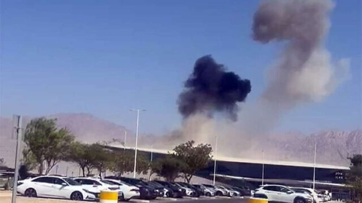 Thick black smoke rises over Ramon Airport in southern Israel after a drone explosion on September 7, 2025.