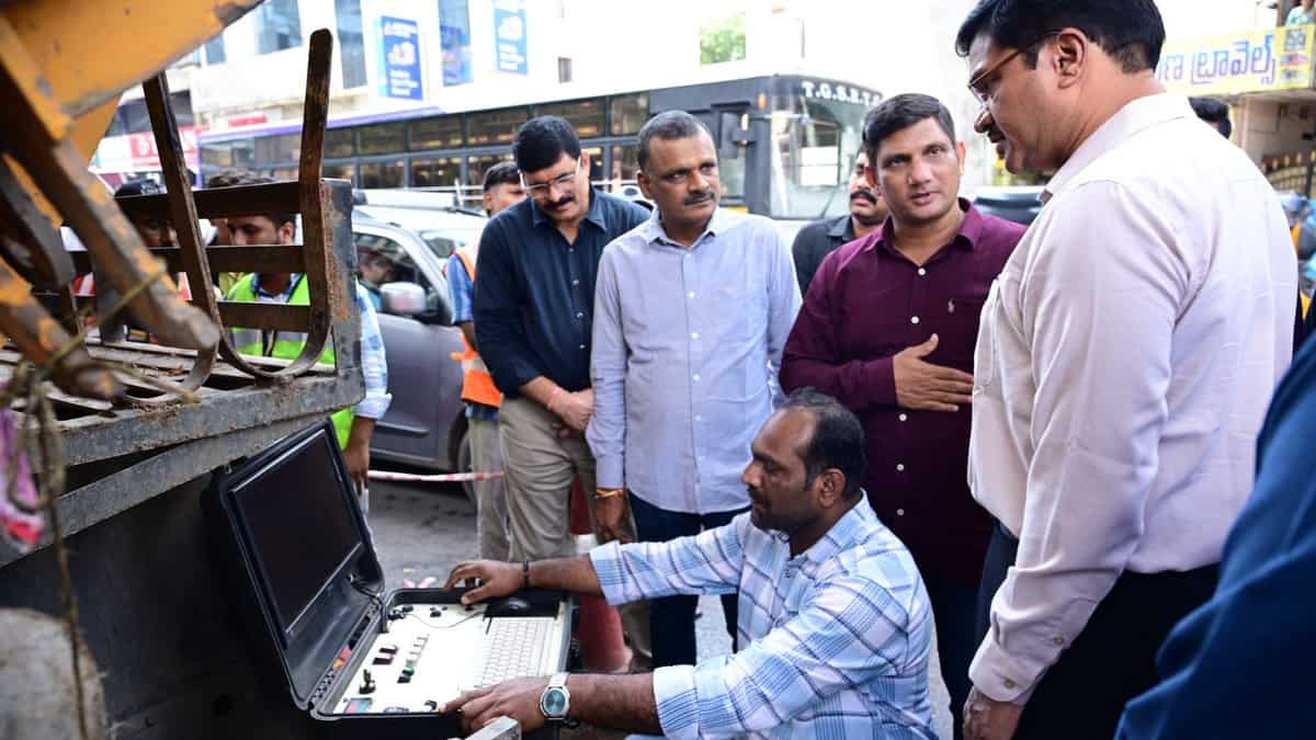 The image shows HYDRAA commissioner AV Ranganath inspecting the de-silting works at the Ameerpet metro station on Tuesday, September 9, 2025.