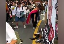 Protesters in Seoul throw shoes at a large poster of Israeli Prime Minister Benjamin Netanyahu during a street demonstration.
