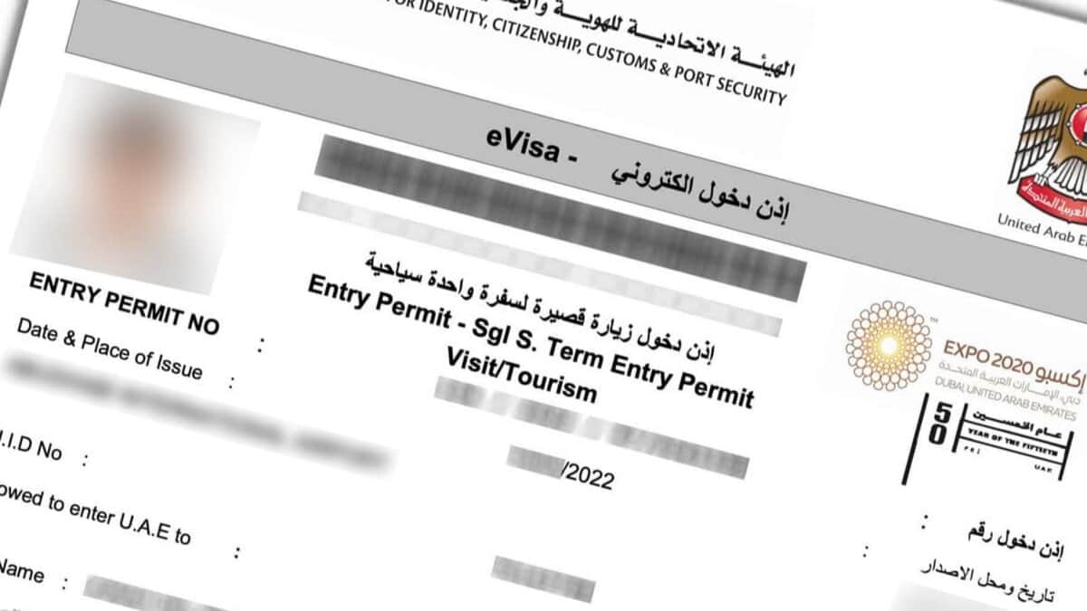 An image of an electronic visa (eVisa) document issued by the United Arab Emirates (UAE) for identity, citizenship, customs, and port security. The document includes sections for entry permit details, such as entry permit number, date and place of issue, visit/tourism entry permit terms, and personal information like name and ID number, though these details are blurred or redacted.