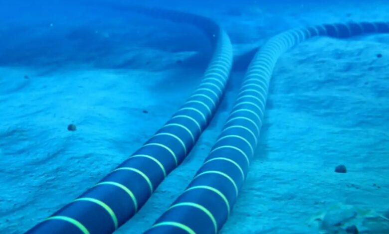 Undersea cables lying on the ocean floor, used for transmitting data across continents.