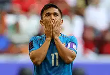 Indian Footballer dejected on the football field