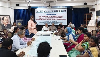 The image shows potential land evictees and activists discussing the Musi Riverfront Development Project's scope in Hyderabad on Friday, October 24, 2025.
