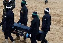 Hamas hands over dead Israeli hostages