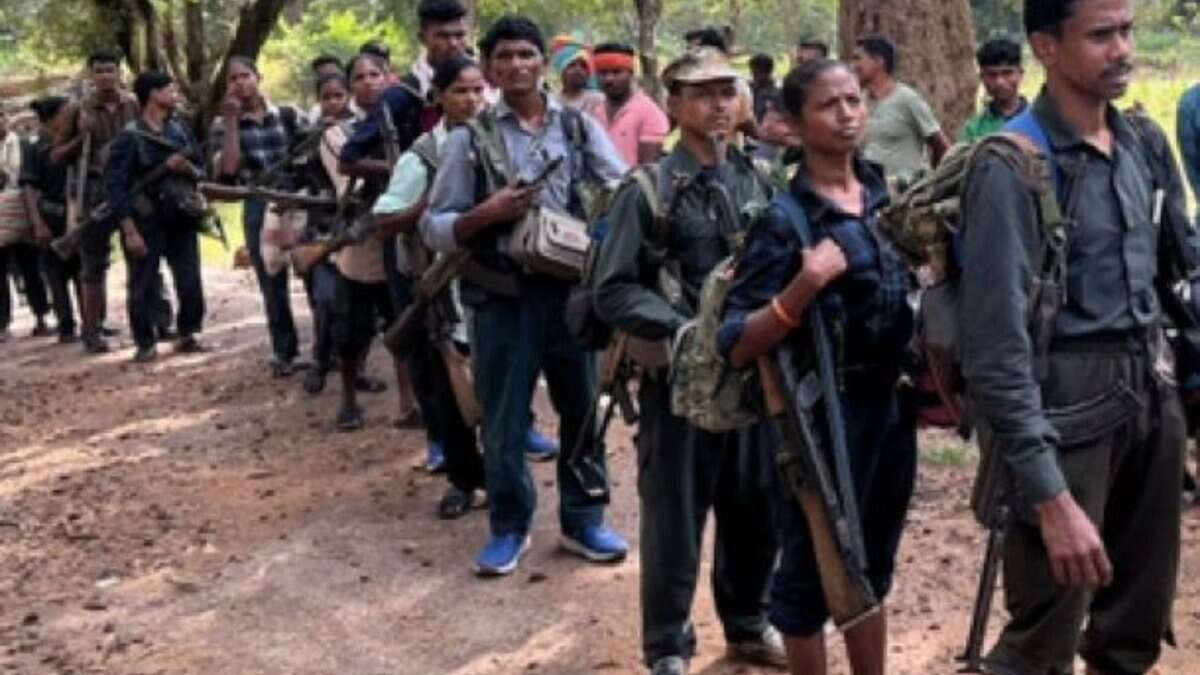Twenty one Maoists surrender in Kanker district of Chhattisgarh on Sunday, October 26, 2025.