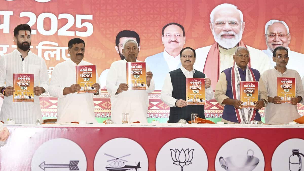 BJP National President and Union Minister JP Nadda with Union Ministers Chirag Paswan and Jitan Ram Manjhi, Bihar Chief Minister Nitish Kumar and JDU National Working President Sanjay Jha releases the National Democratic Alliance's (NDA) manifesto for the upcoming Bihar Assembly elections, in Patna, Friday, Oct. 31, 2025. (PTI Photo)