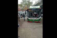 An RTC bus is stuck in a pothole in Hyderabad
