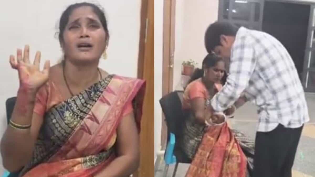 The image shows Gangamani of Bhainsa mandal with her wrist slit, and a medical official giving her first-aid during Prajavani at Nirmal collectorate on Monday, October 13, 2025.