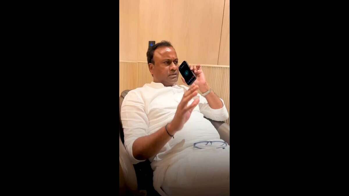 Komatireddy Rajgopal Reddy speaks to officials on the phone