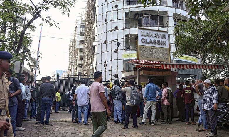 Mumbai: People gather at the site where 19 persons including 17 children were rescued from a studio in Powai area while the man who had held them hostage succumbed to bullet injuries sustained during the operation, in Mumbai, Thursday, Oct. 30, 2025. (PTI Photo)