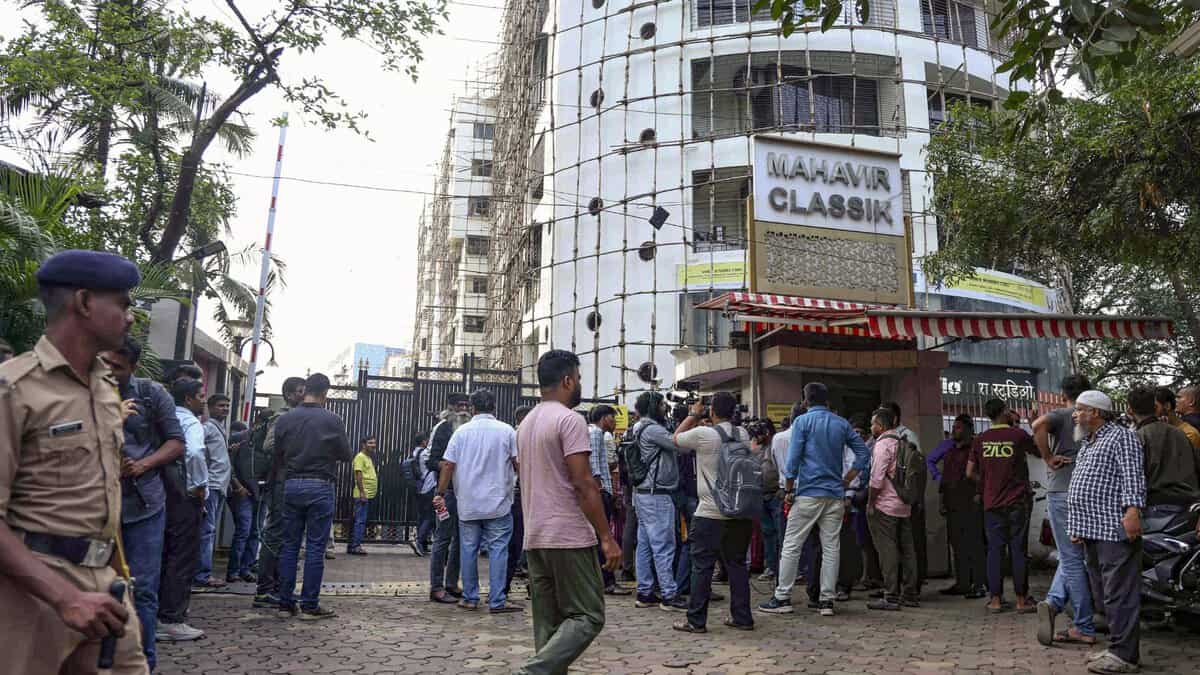Mumbai: People gather at the site where 19 persons including 17 children were rescued from a studio in Powai area while the man who had held them hostage succumbed to bullet injuries sustained during the operation, in Mumbai, Thursday, Oct. 30, 2025. (PTI Photo)