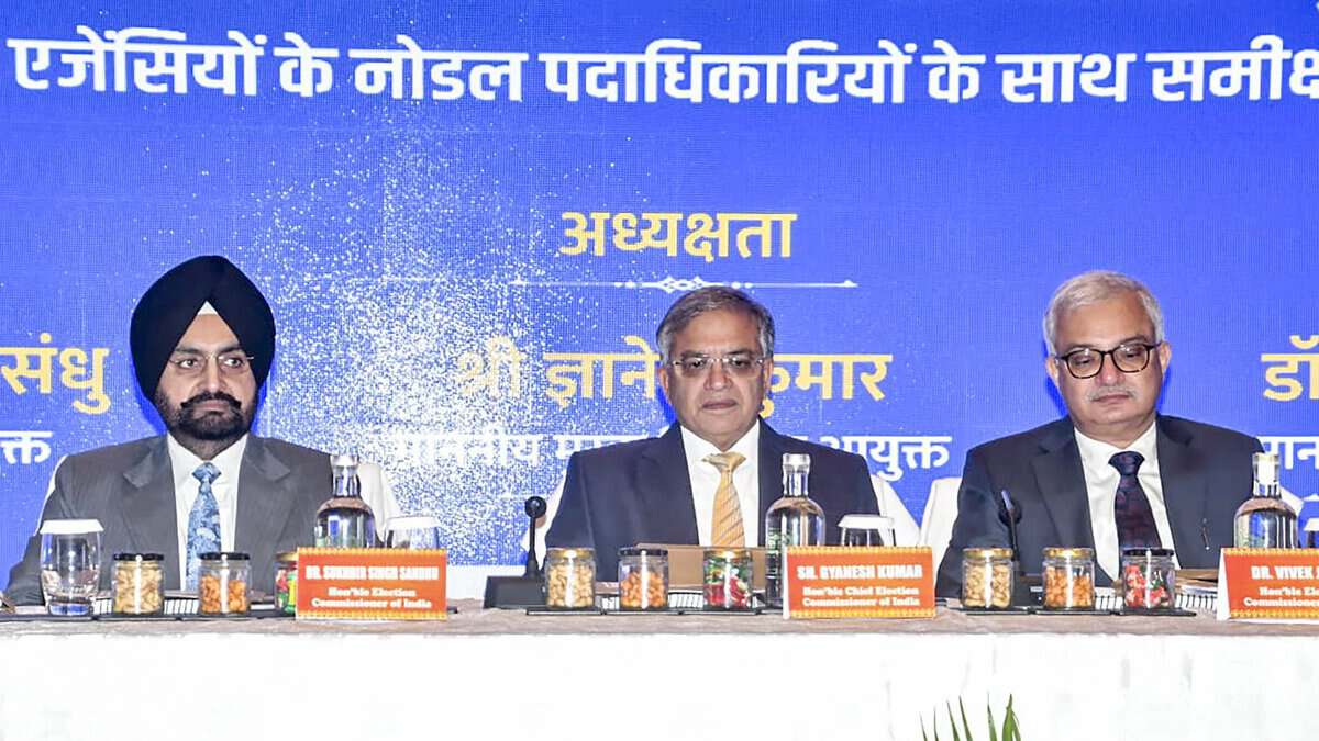 Chief Election Commissioner Gyanesh Kumar (center) with Election Commissioners Sukhbir Singh Sandhu (left) and Vivek Joshi (right) during a meeting with Heads/Nodal Officers of Enforcement Agencies in Bihar. (PTI Photo)