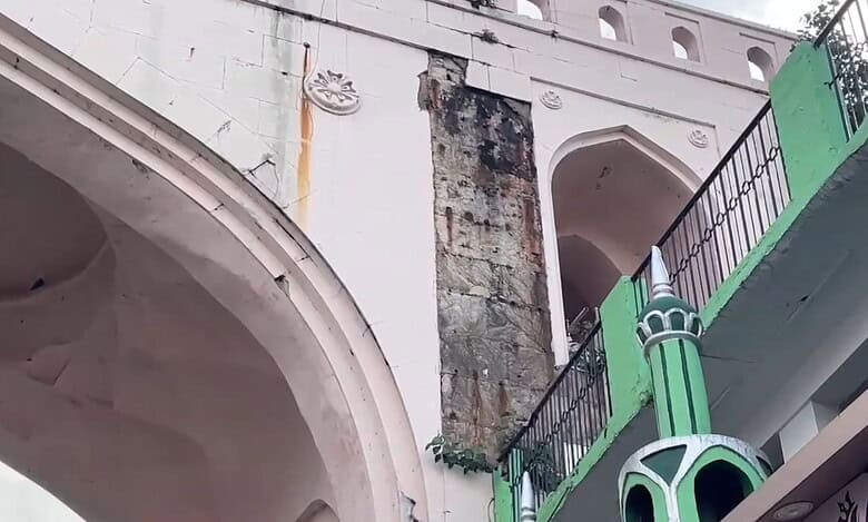A piece of lime plaster, in Charminar, collapsed on a local gravely injuring him