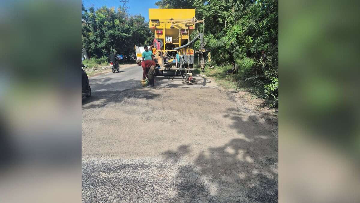 GHMC workers fill up pothole in Hyderabad