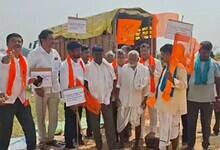 Members of the Bharatiya Kissan Sangh protest in Nirmal district