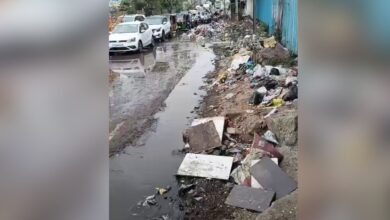 Commuters navigate through garbage in Kukatpally