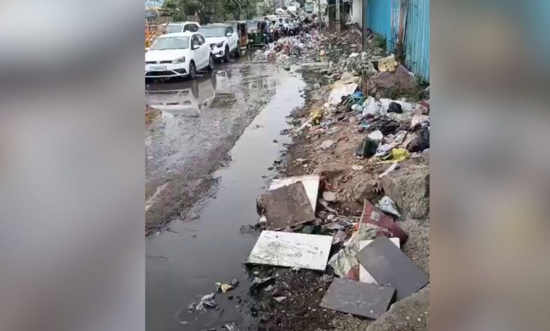 Commuters navigate through garbage in Kukatpally