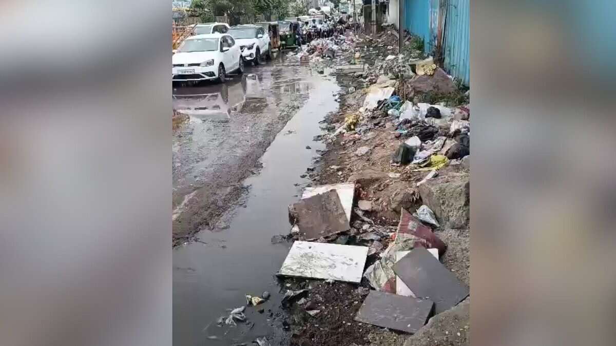 Commuters navigate through garbage in Kukatpally