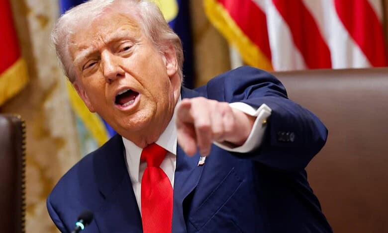 US President Donald Trump addresses a meeting